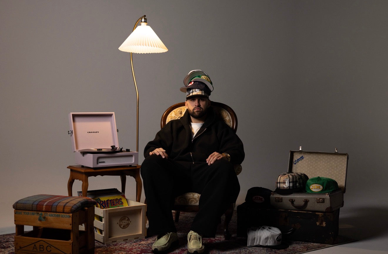 JIM. hats styled with a record player and vintage furniture